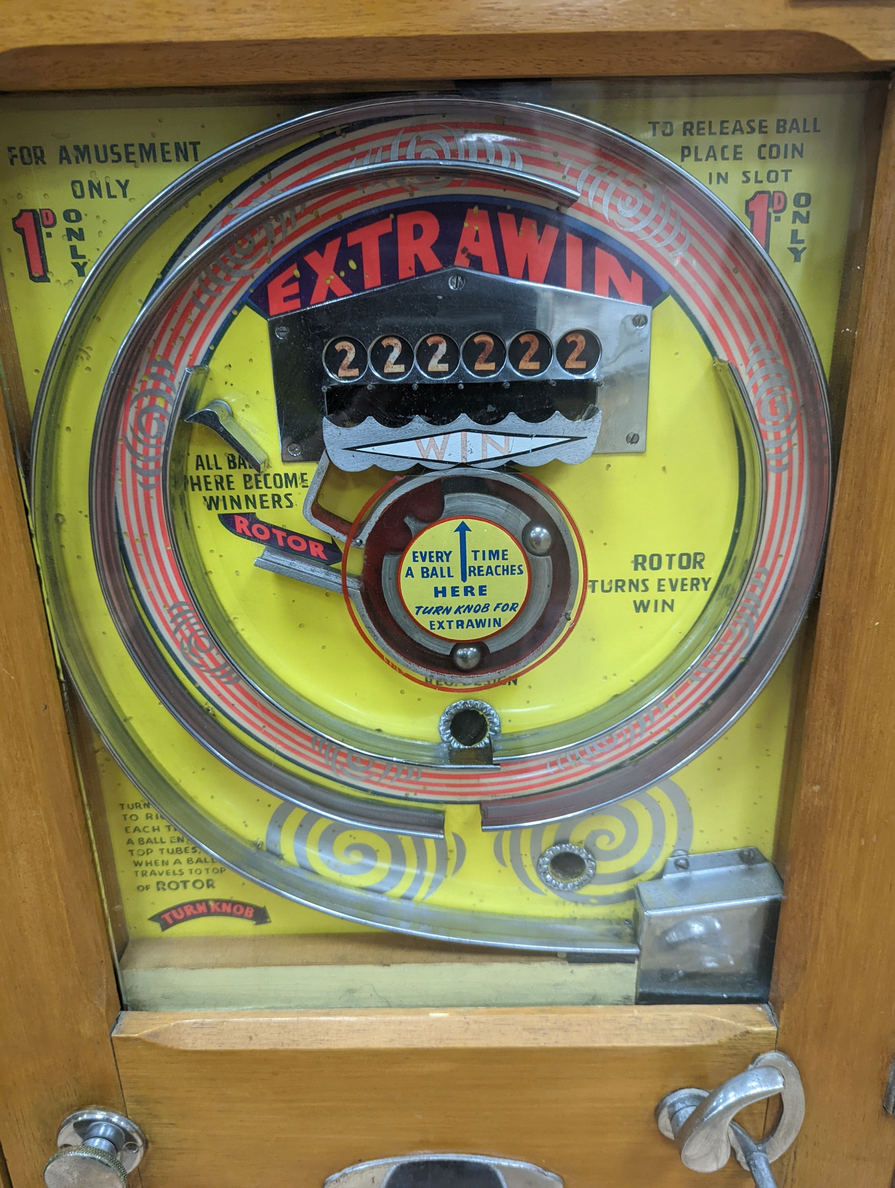 An Extrawin coin operated games machine, 87cms high.